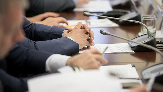 Menschen in einer Konferenz.